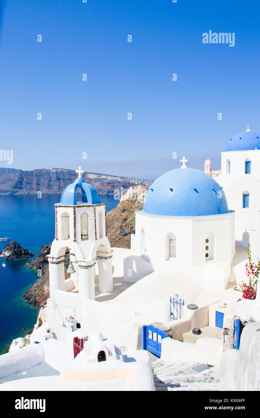 Santorini famous scene with the three domes Stock Photo - Alamy