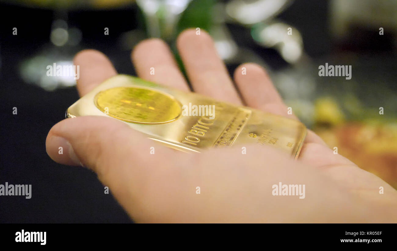 Golden bitcoin. BTC gold. Gold ingot as a ten bitcoin Stock Photo - Alamy
