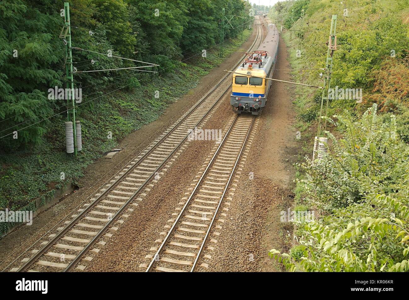 Railway line with train Stock Photo