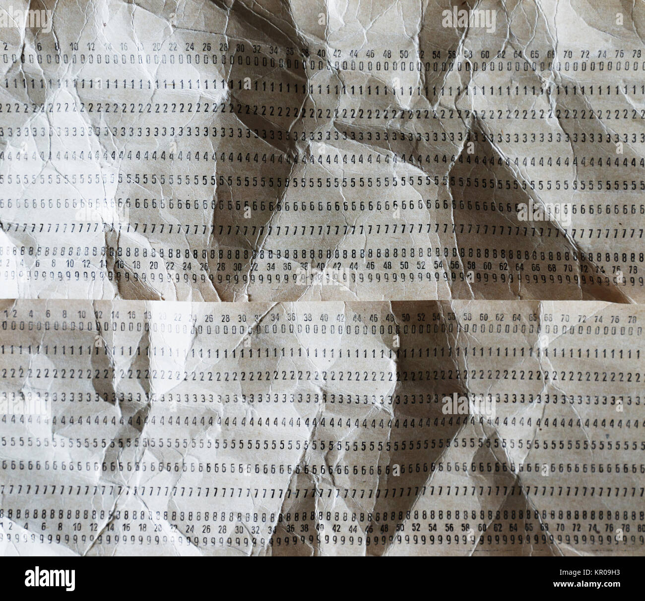 Horizontal crumpled punched cards background Stock Photo