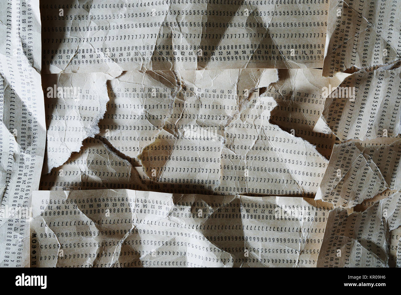 Horizontal crumpled punched cards composition Stock Photo