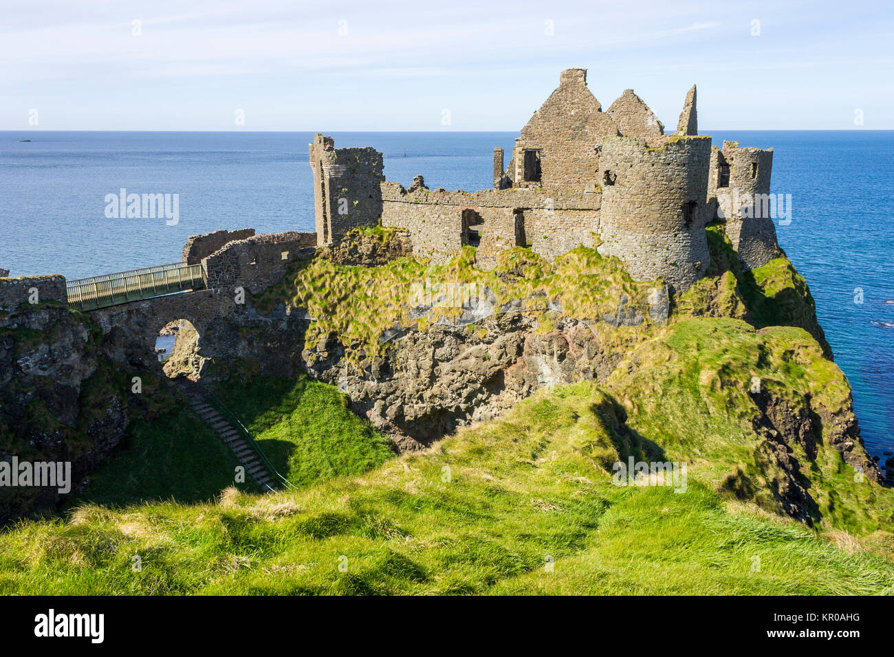 Dunluce Castle (Irish: Dun Libhse), a now-ruined medieval castle located on the edge of a basalt outcropping in County Antrim, Northern Ireland Stock Photo