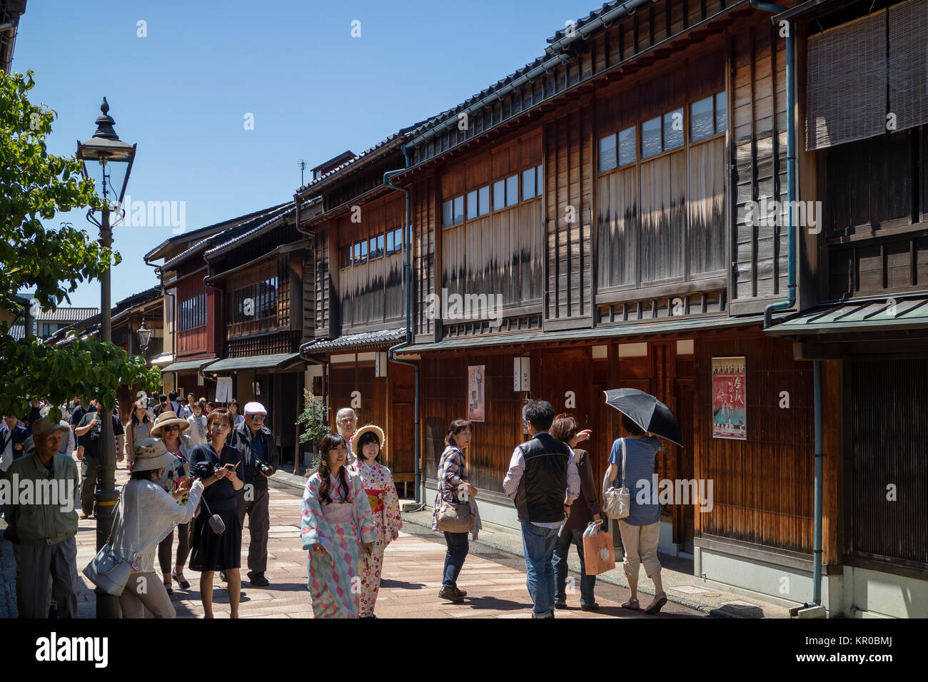 Kanazawa - Japan, June 11, 2017: Tourists and women in kimono walking in the historical Higashi Chaya District, Kanazawa City, Ishikawa Prefecture Stock Photo