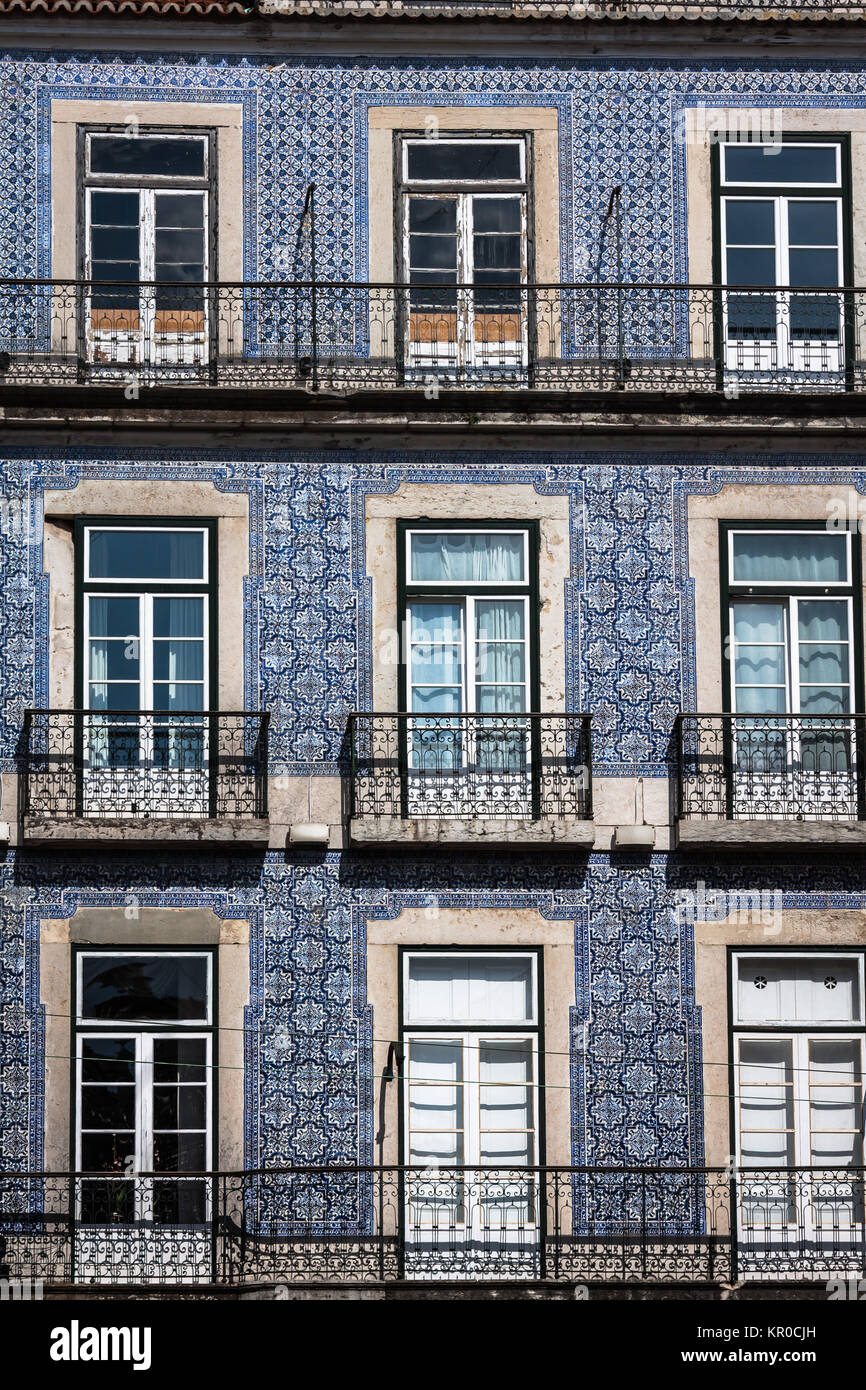 lisbon traditional buildings with typical portuguese tiles on the wall