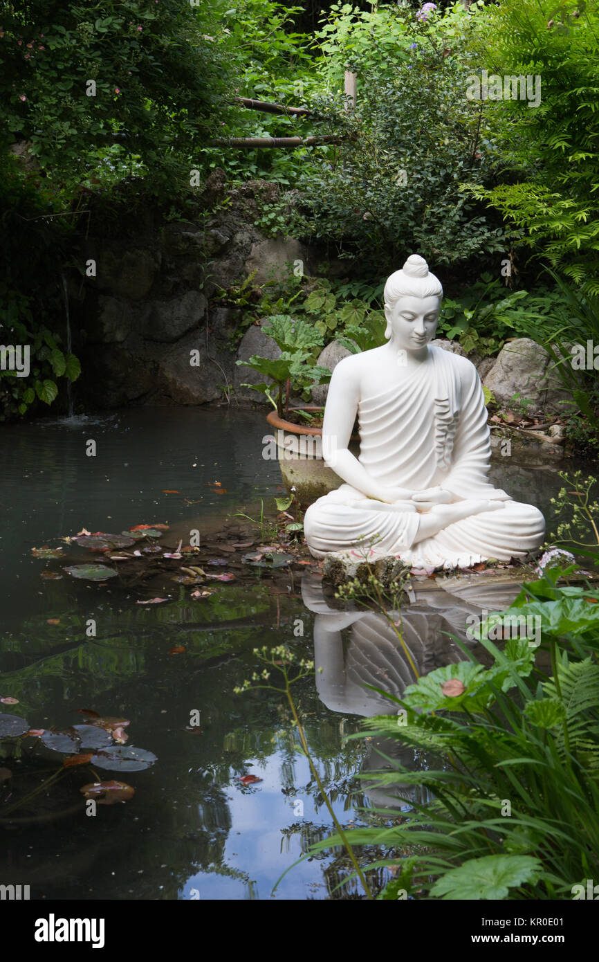 Buddha statue in Andre Heller garden in Gardone Riviera, Lombardia, Italy Stock Photo