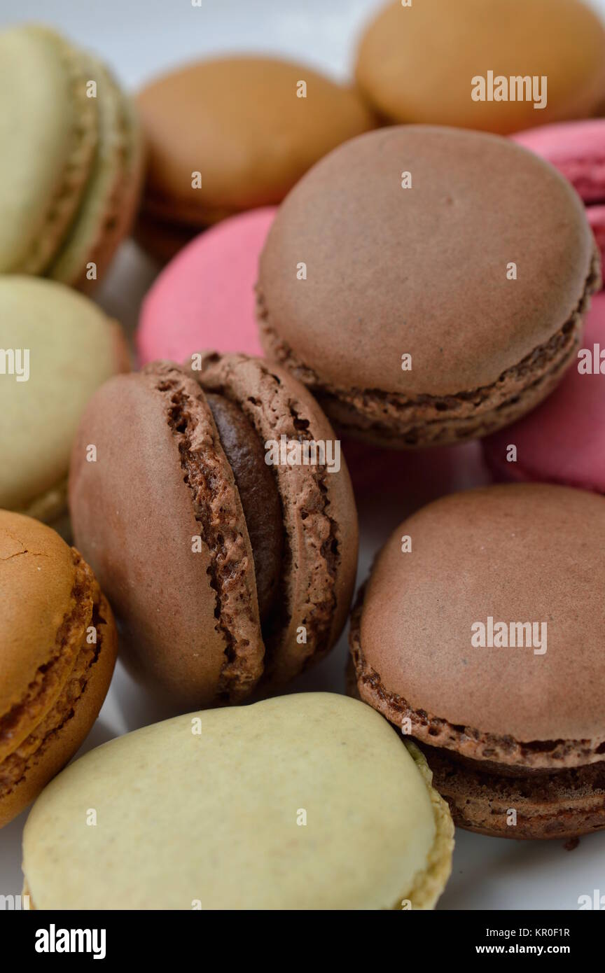 colorful macaroons on a white plate Stock Photo