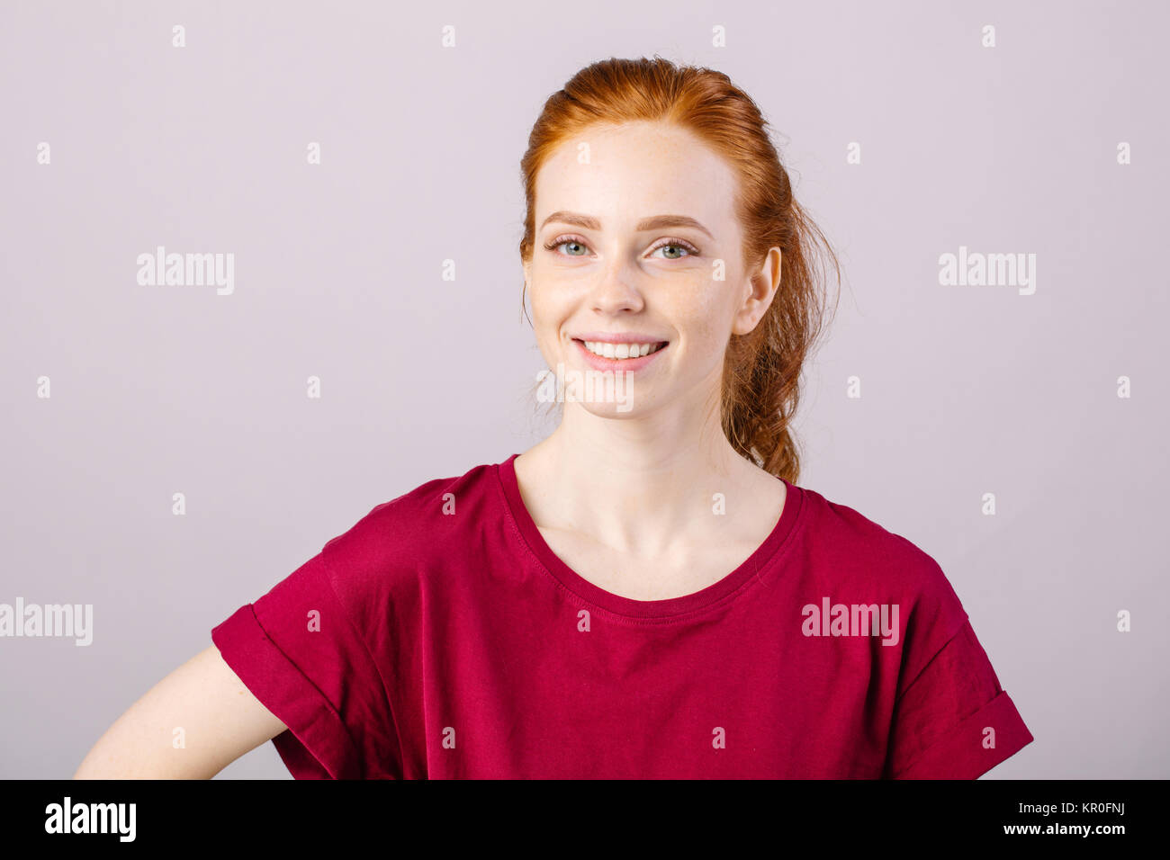 smiling woman posing isolated on white background Stock Photo - Alamy