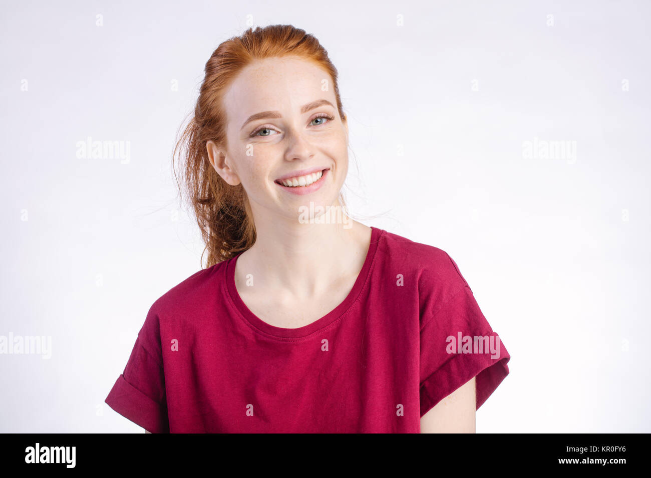 smiling woman posing isolated on white background Stock Photo - Alamy
