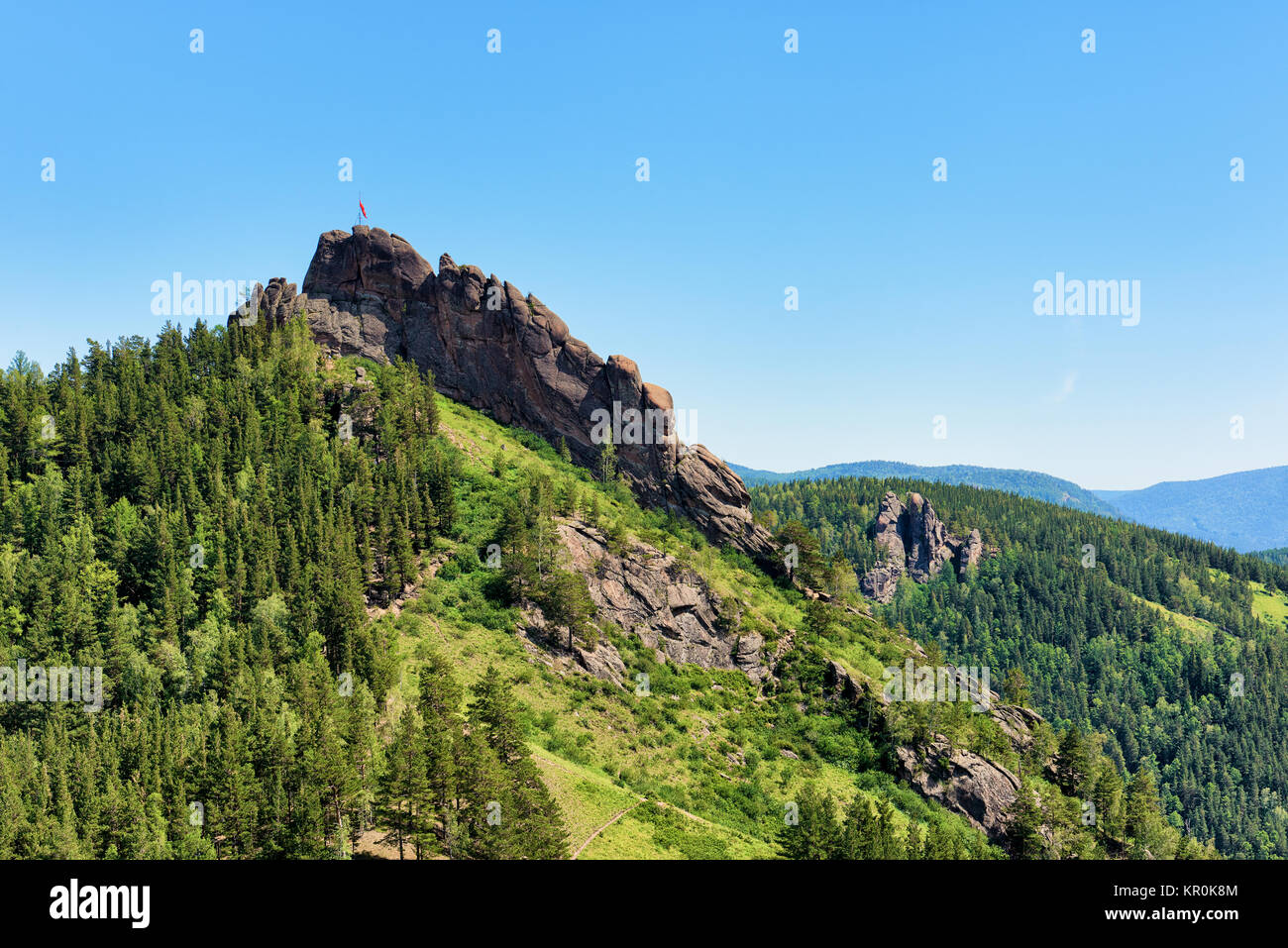 Takmak rock massif. Fanciful rocks in June afternoon. Stolby Nature Sanctuary (Pillars). Krasnoyarsk region. Russia Stock Photo