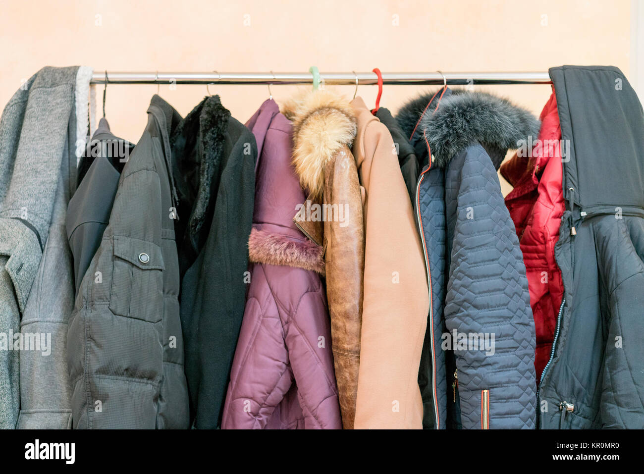 Winter Clothing And Coat Hanger High Resolution Stock Photography and