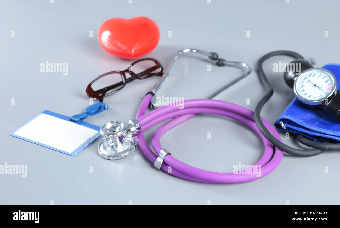 Red heart and a stethoscope on white background Stock Photo - Alamy