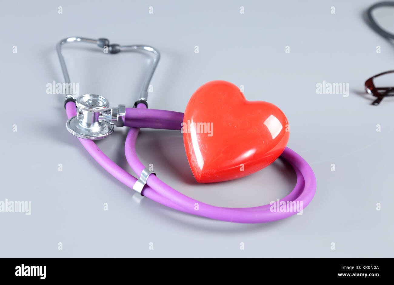 Red heart and a stethoscope on white background Stock Photo - Alamy