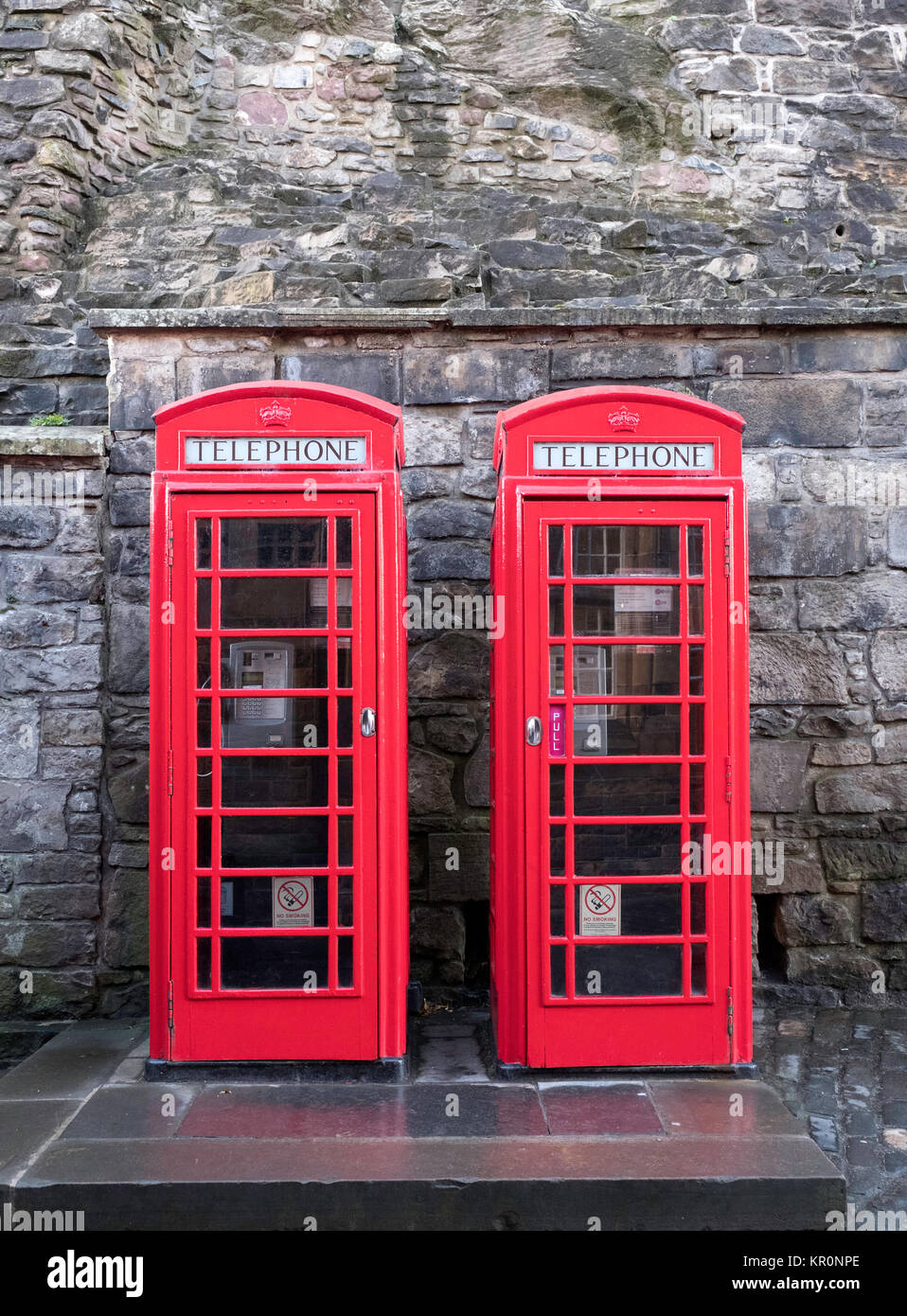 Two traditional red telephone boxes Stock Photo