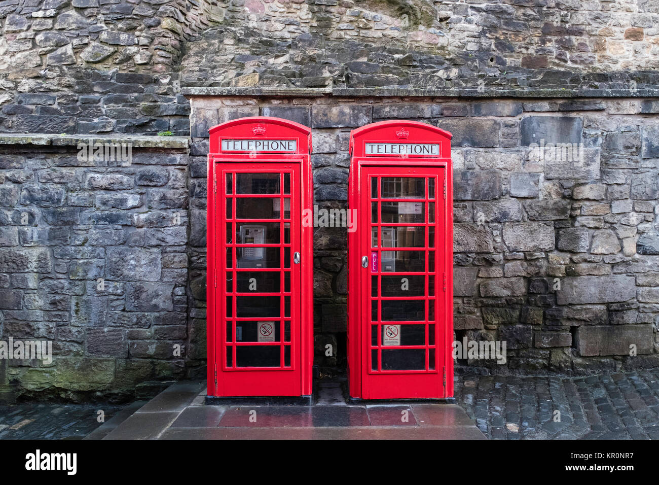 Two traditional red telephone boxes Stock Photo