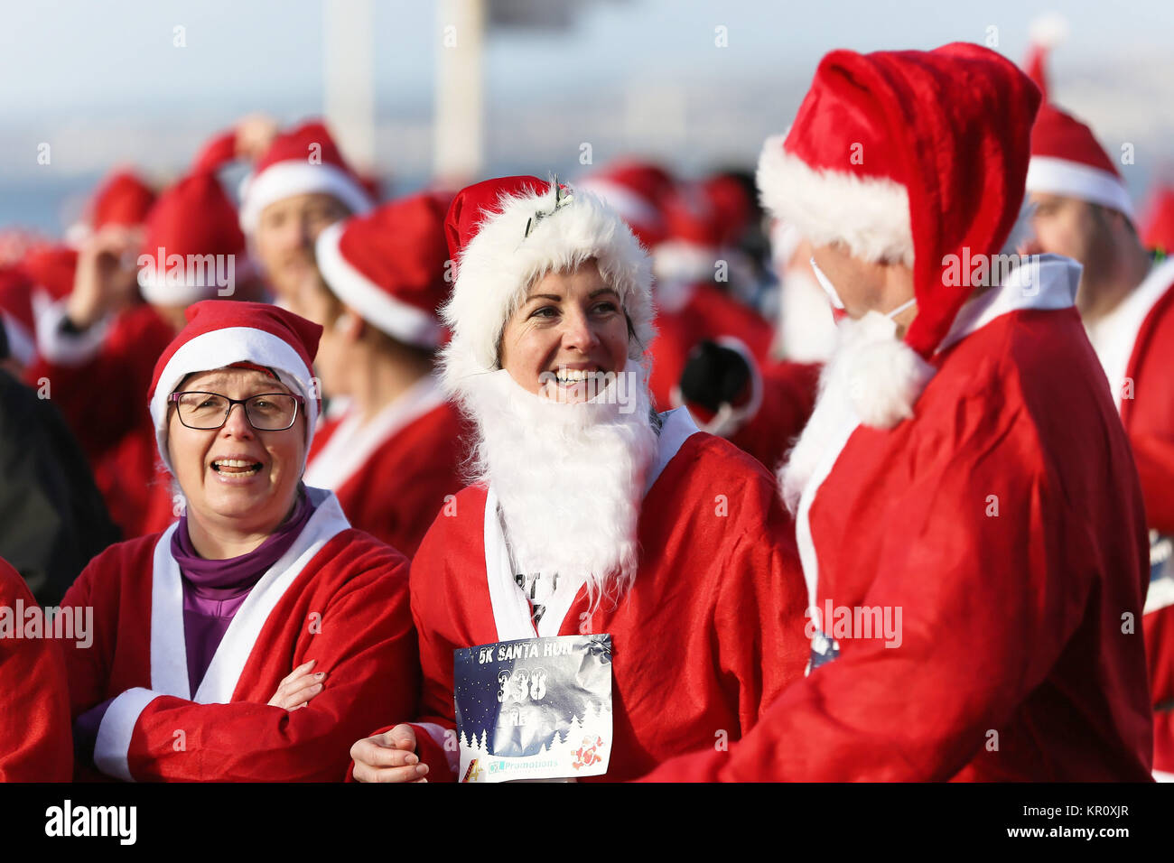 Pictured: Runners in Santa Claus fancy dress take part in this year's run in Aberavon, Wales, UK. Saturday 16 December 2017 Re: 500 people have taken  Stock Photo