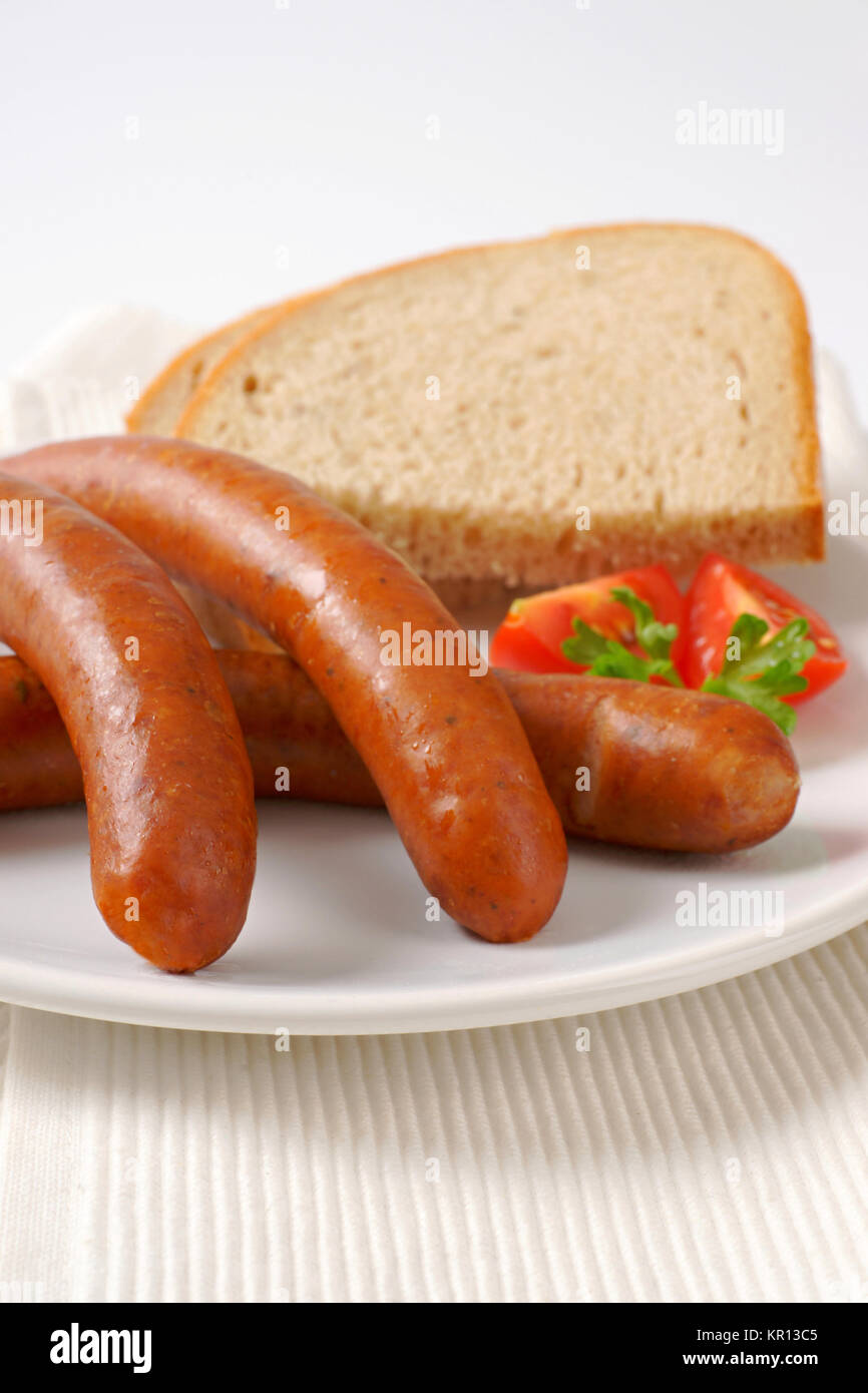 cooked sausages with bread Stock Photo Alamy