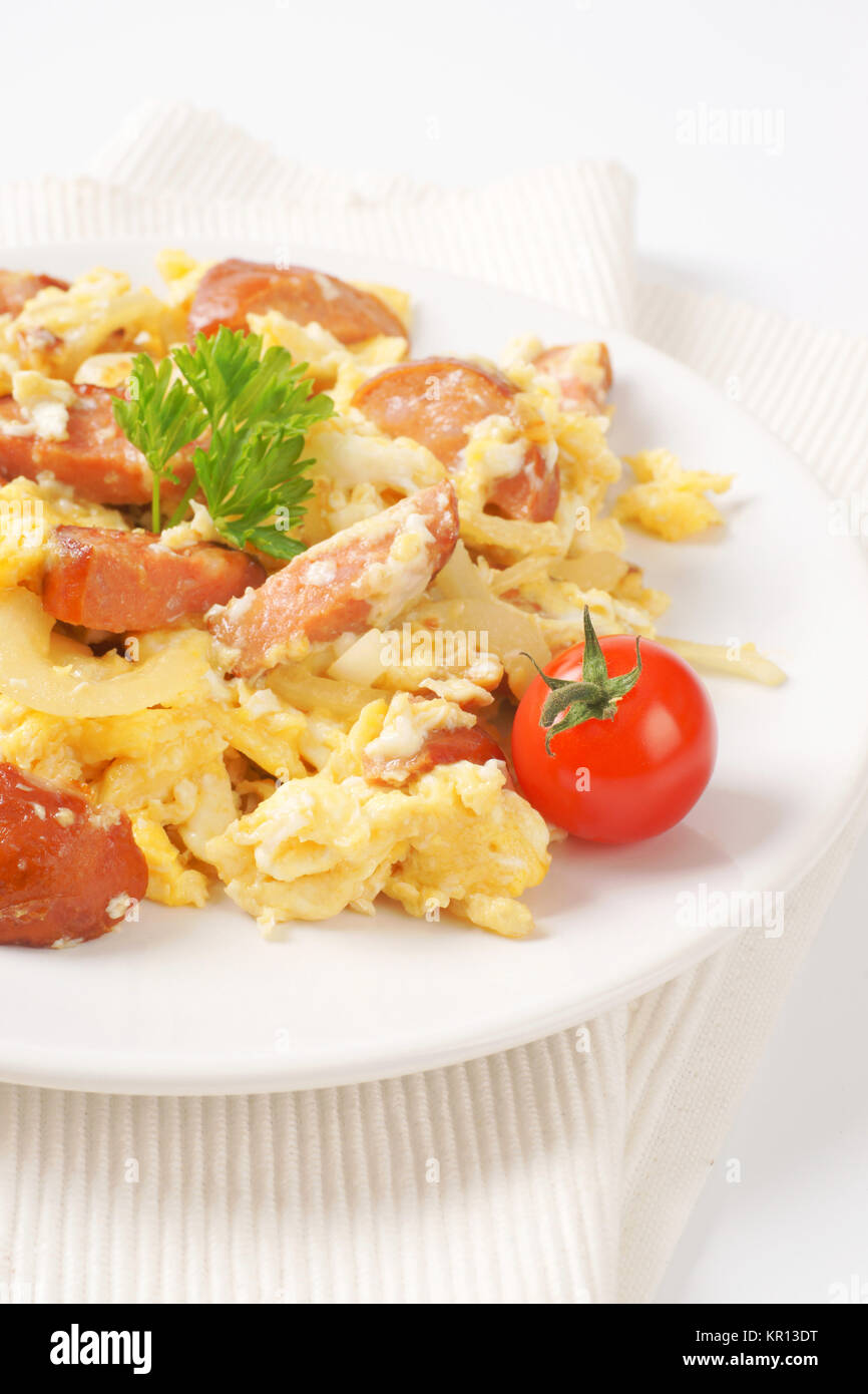 scrambled eggs with sliced sausage Stock Photo - Alamy