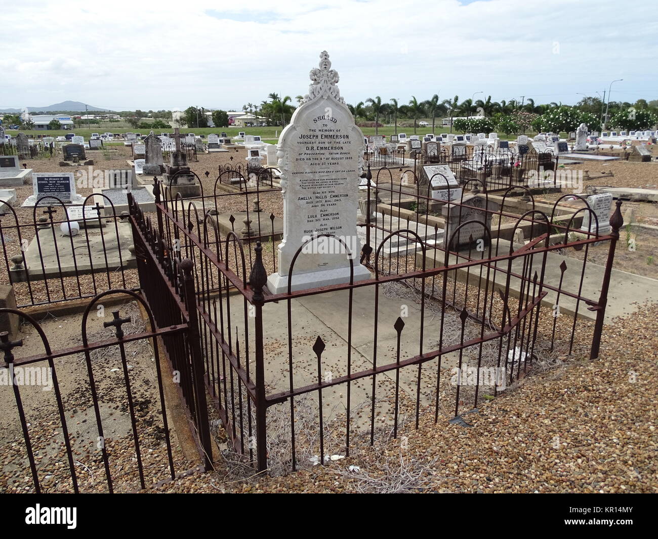 A old tombstone located in a rural cemetery in tropical North ...