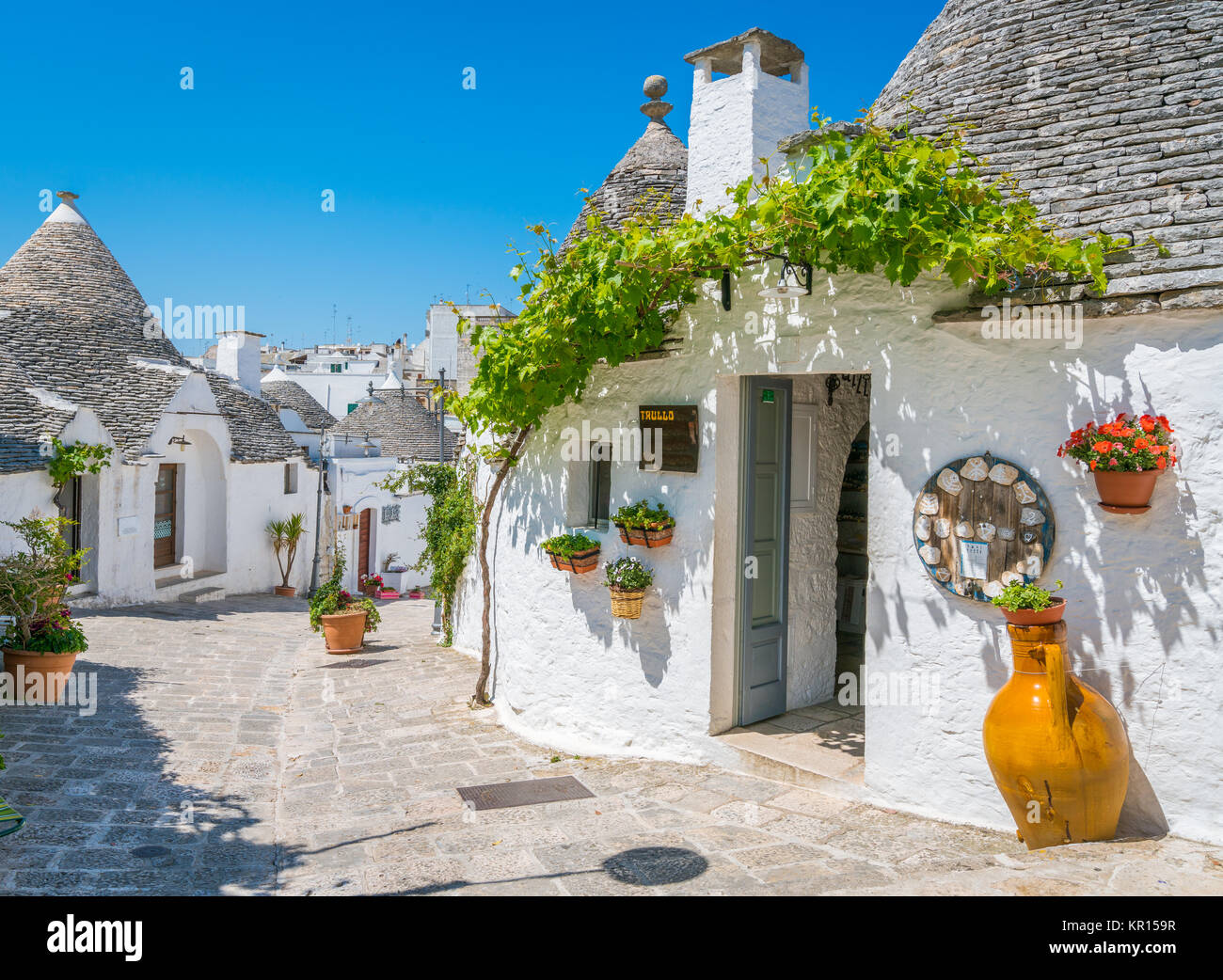 Scenic sight in Alberobello, the famous Trulli village in Apulia ...