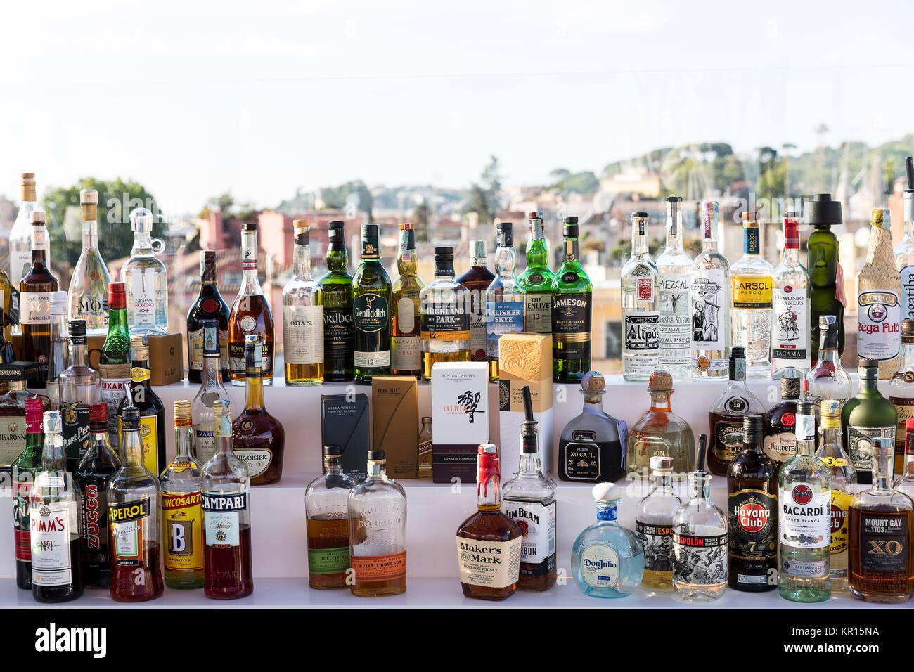 Liquor bottles in an outdoor bar Stock Photo