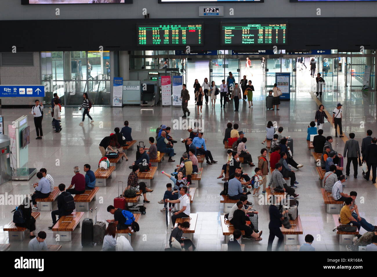 Crowd of people inside Busan Station. Busan Station is a main train station in Busan, South Korea. Stock Photo