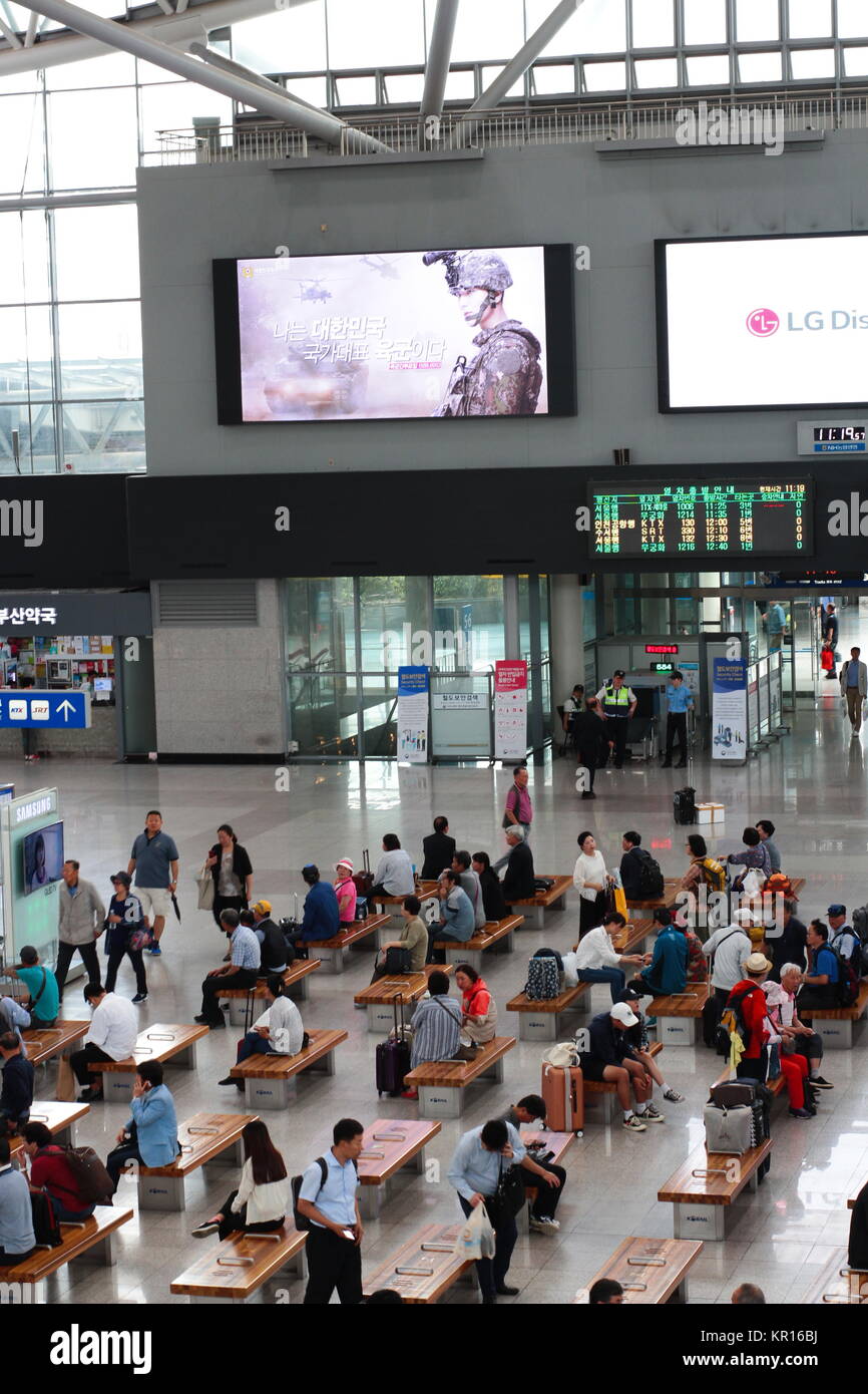 Crowd of people inside Busan Station. Busan Station is a main train station in Busan, South Korea. Stock Photo