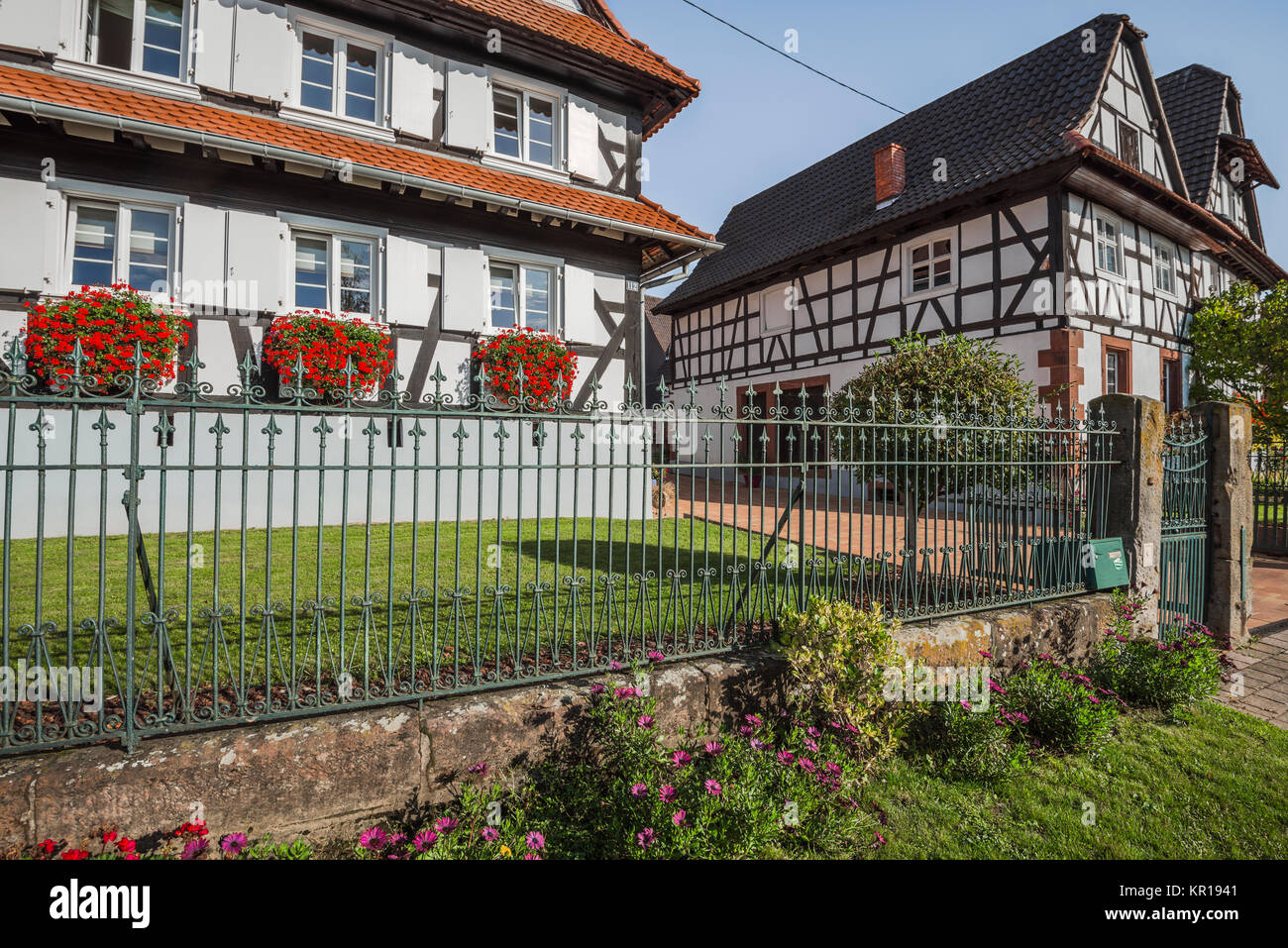 traditional house with flower decoration in Seebach, Alsace, department Bas-Rhin, member of the association of the most beautiful villages in France Stock Photo