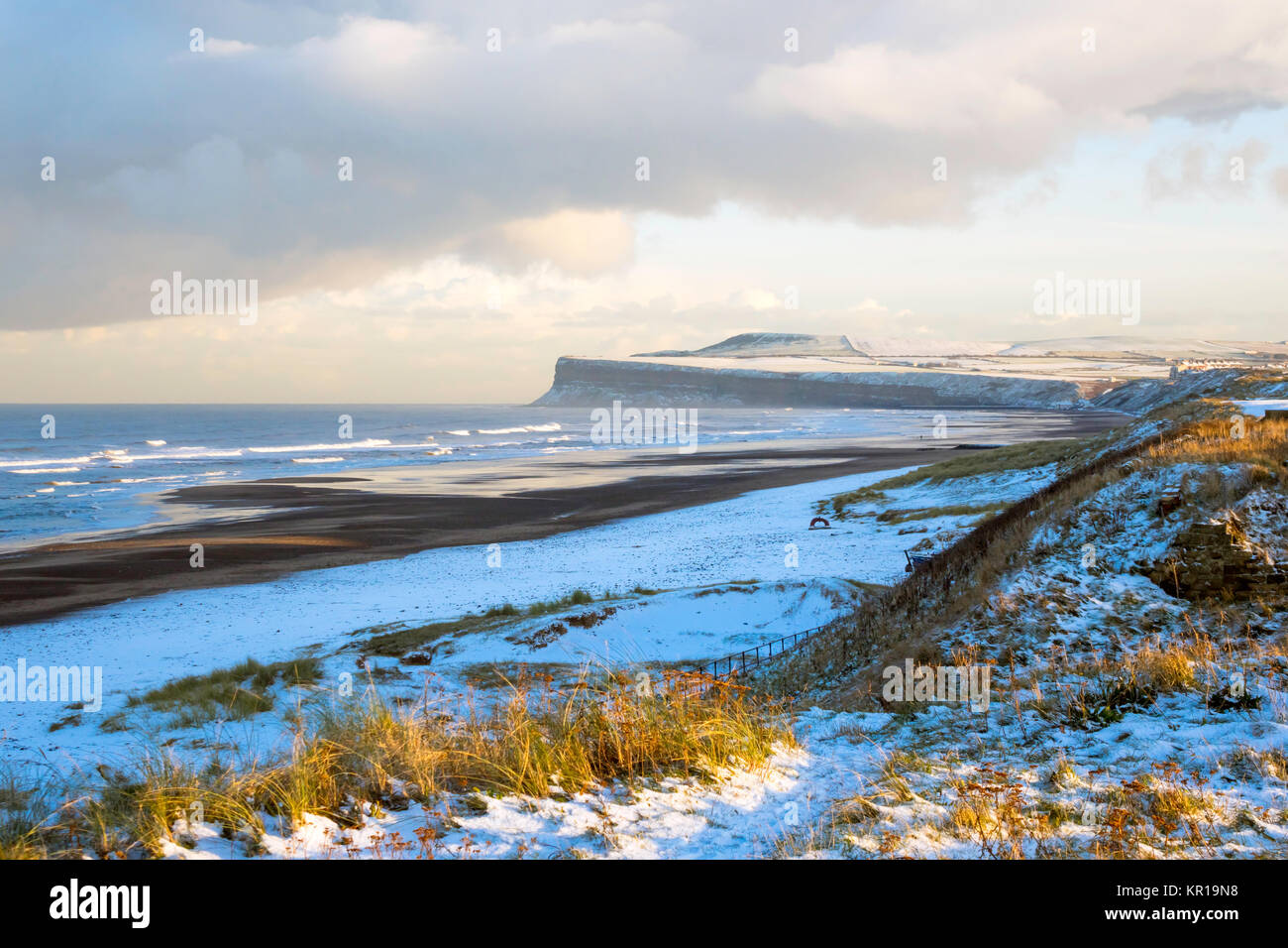 Snow covered beach at Marske by the Sea North Yorkshire UK, looking