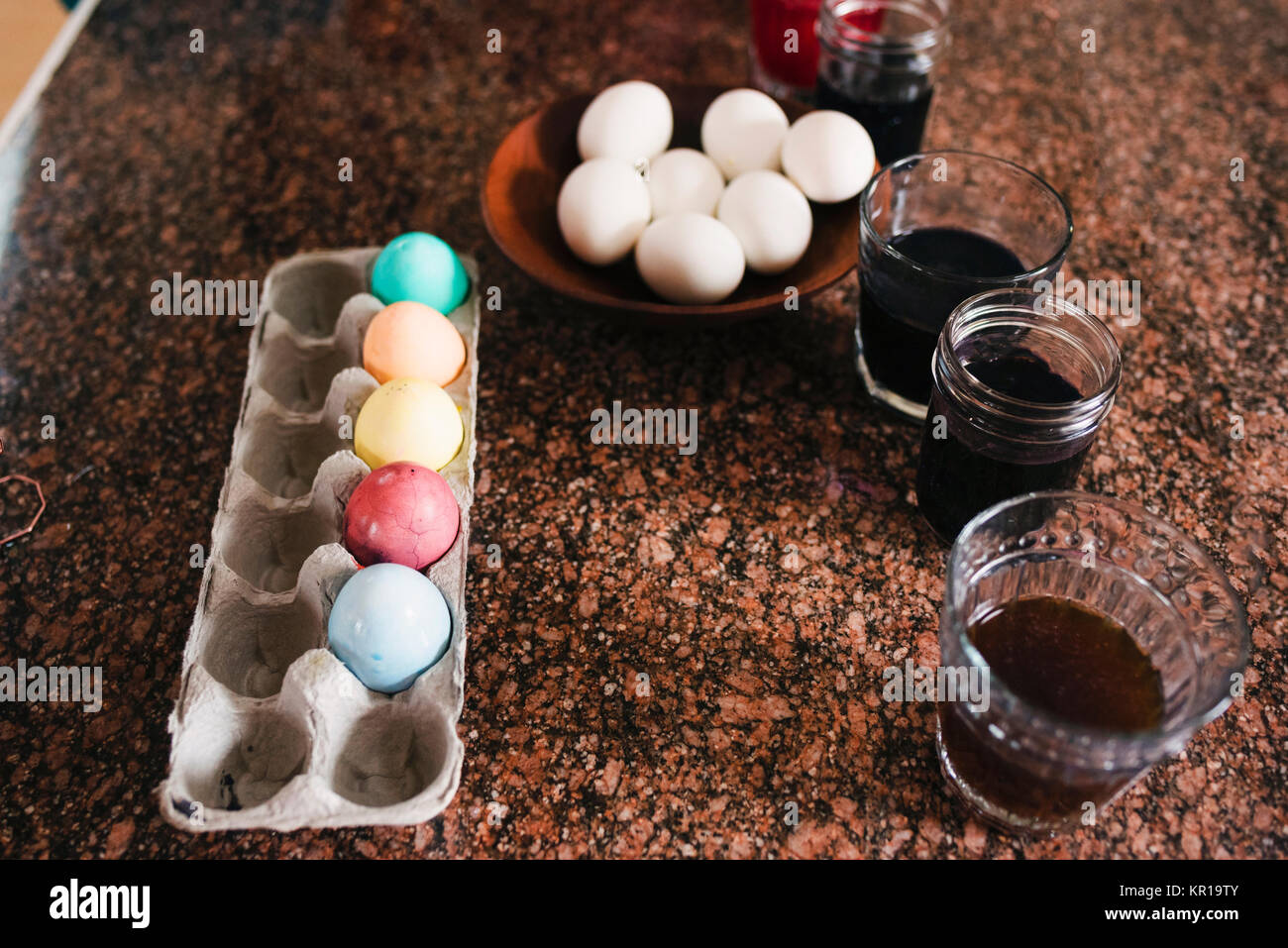 Eggs and dye to make Easter eggs Stock Photo