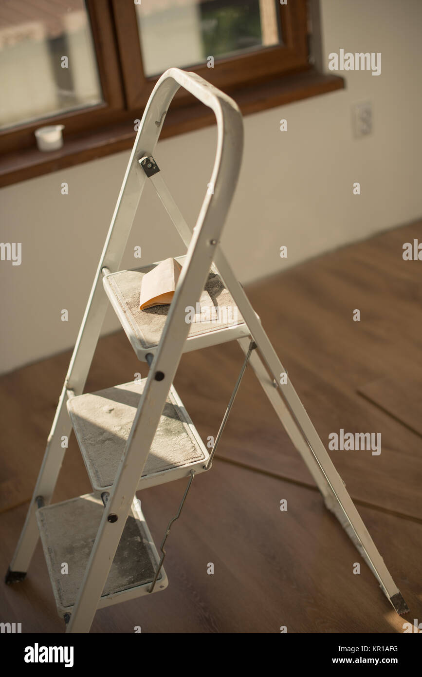 Sandpaper on a step ladder Stock Photo