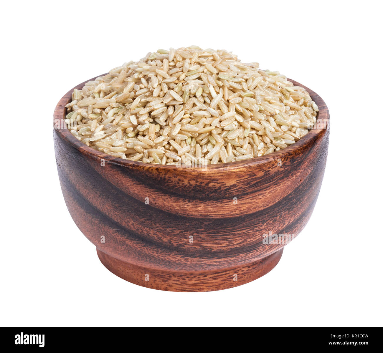 Brown rice groats in wooden bowl isolated on white background Stock Photo