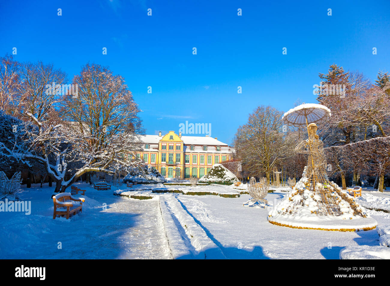 Snow covered city park in a winter day. Oliwa, Poland. Stock Photo