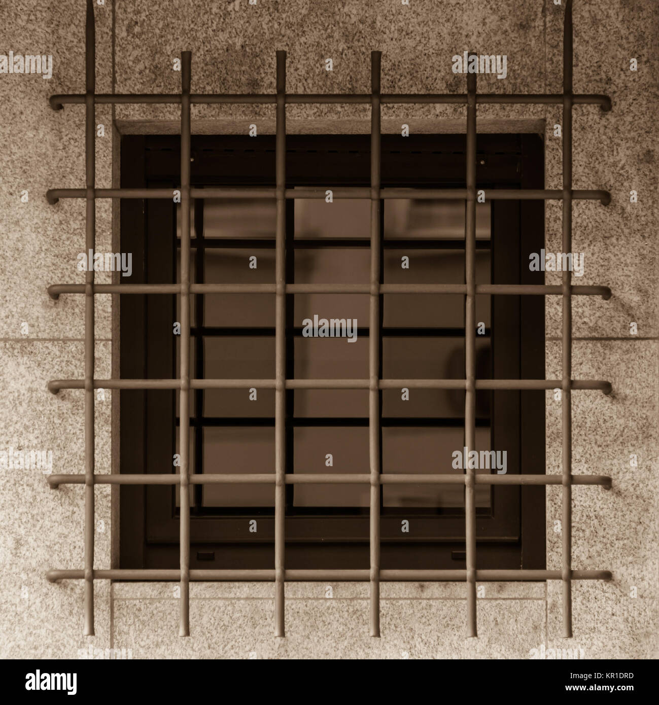 Jailhouse window with iron grille Stock Photo