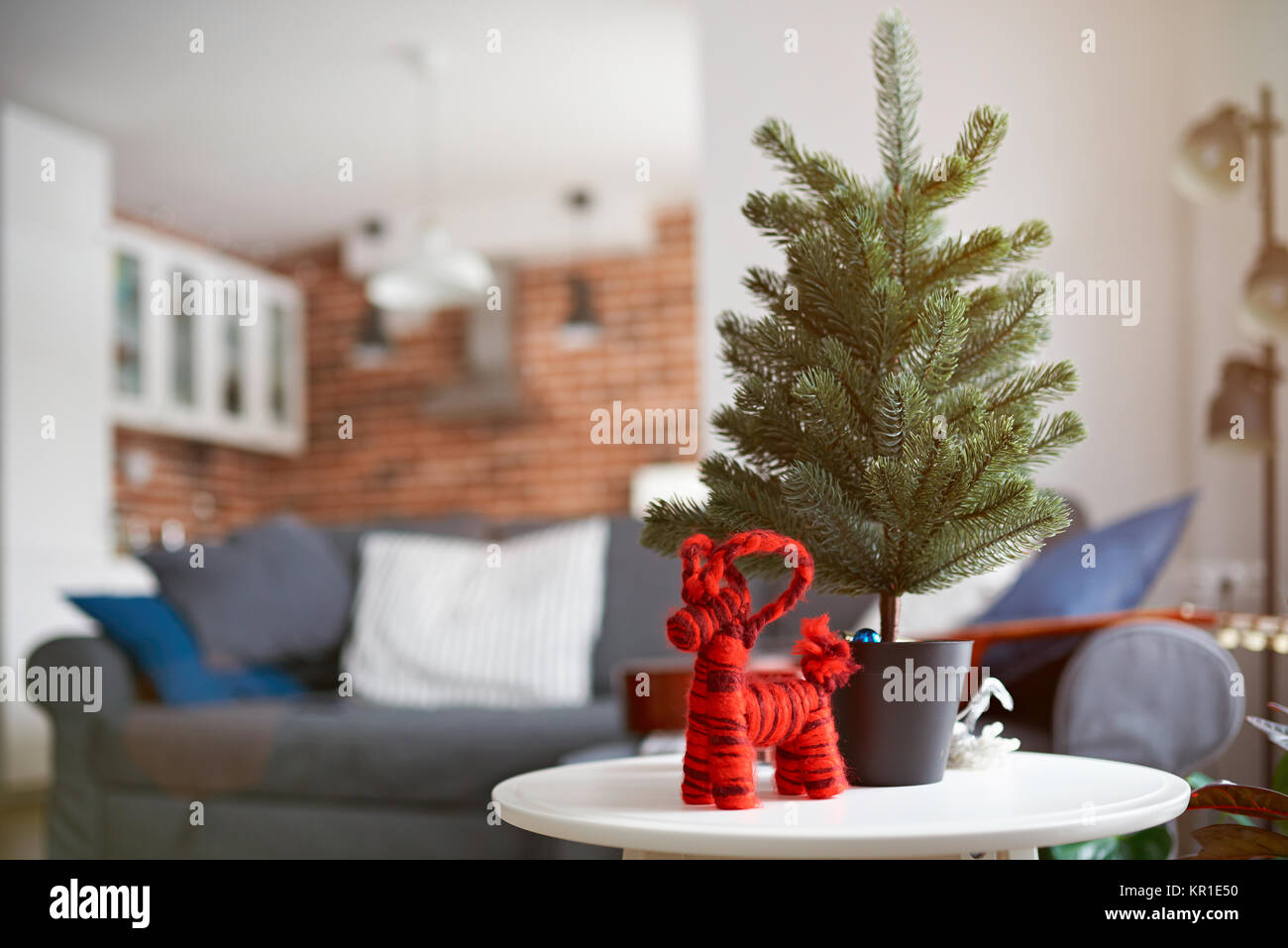 Red christmas toy with pine tree on modern apartments interior Stock Photo