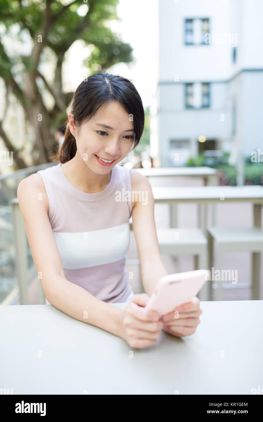 Asian Woman use of smart phone Stock Photo - Alamy