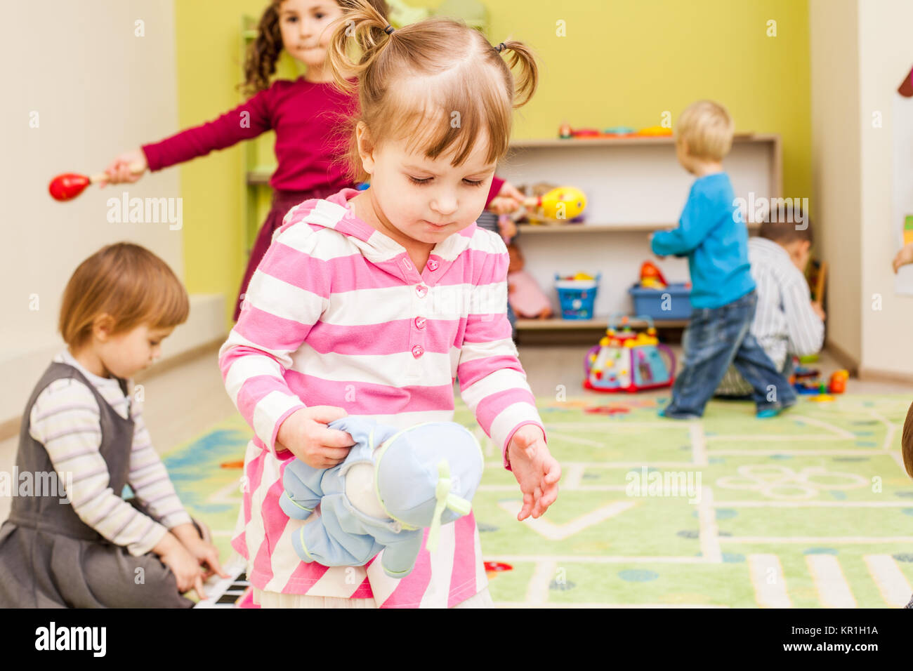 Games at the kindergarten Stock Photo - Alamy