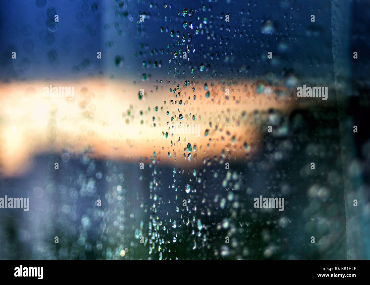 Raindrops on glass abstract background Stock Photo - Alamy