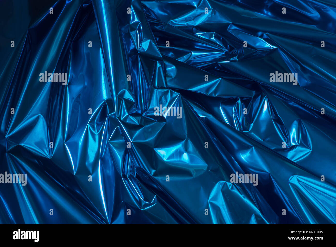 blue color folded metallic foil abstract bacgkground Stock Photo Alamy