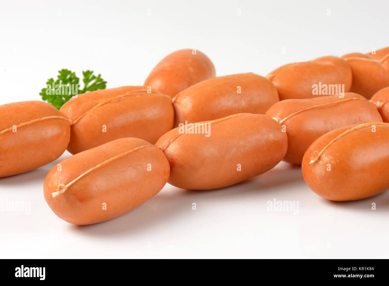 raw short sausages Stock Photo Alamy