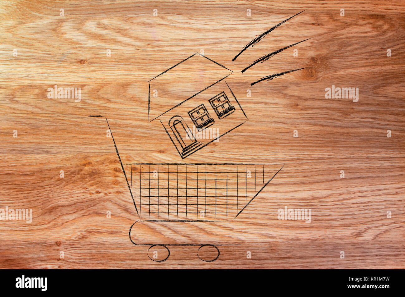 real estate market, house dropped into shopping cart Stock Photo Alamy