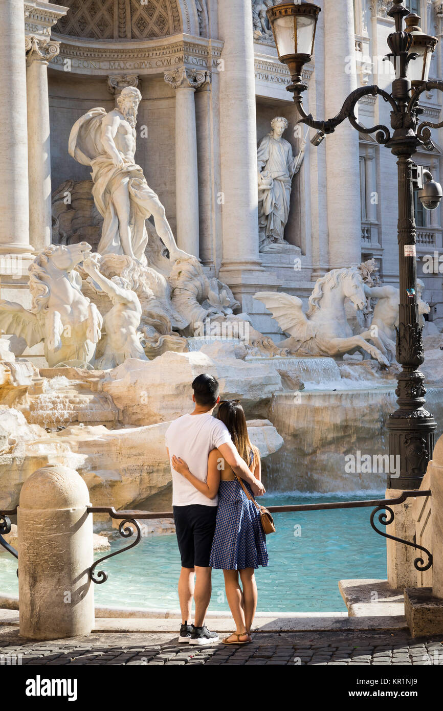 Couple at the Trevi fountain in Rome Italy Stock Photo