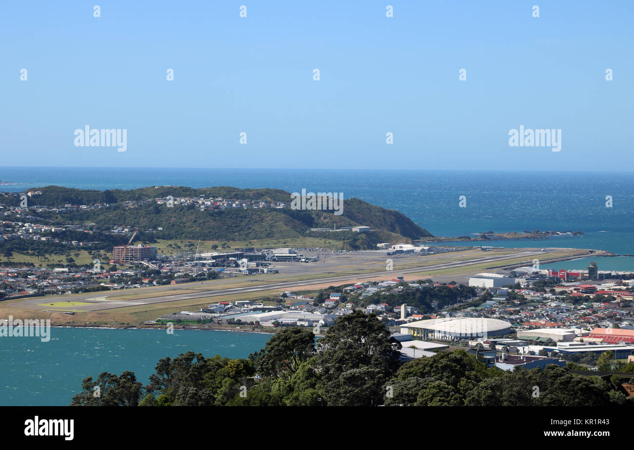 View from Mount Victoria Lookout, Wellington, North Island, New Zealand  looking down towards the airport with a planes preparing for takeoff. Stock Photo