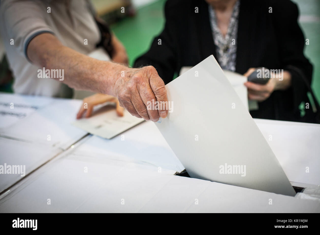 Voting hand detail Stock Photo - Alamy