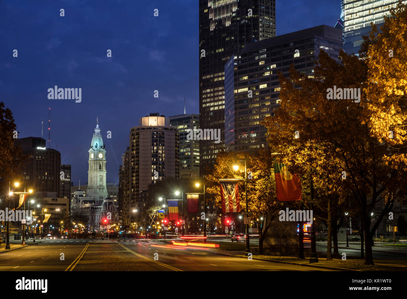 Benjamin Franklin Parkway and Philadelphia skyline leading to city hall in fall at night, Philadelphia, Pennsylvania, USA Stock Photo