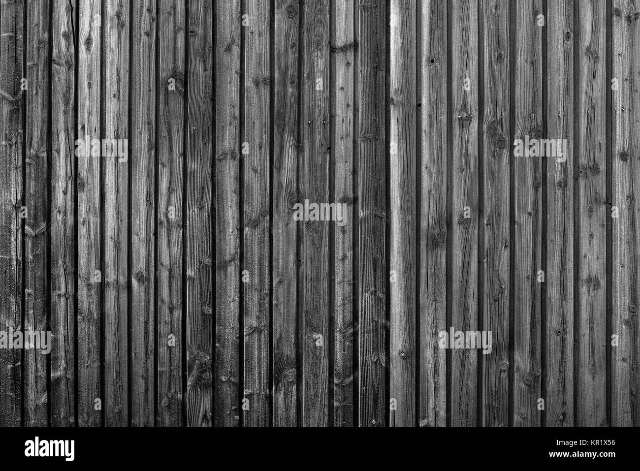 detail of a dark wooden wall of vertical boards Stock Photo Alamy