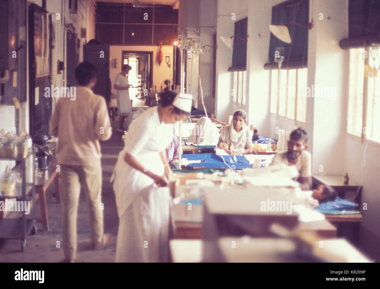This photograph was taken in a foreign hospital during an Epidemic Investigative Services (EIS) field study, 1973. Since the program's establishment in 1951, EIS officers have worked on more than 10, 000 studies and investigations. Each year, EIS officers assist with approximately 100 investigations requested by states and other countries. Image courtesy CDC. Stock Photo