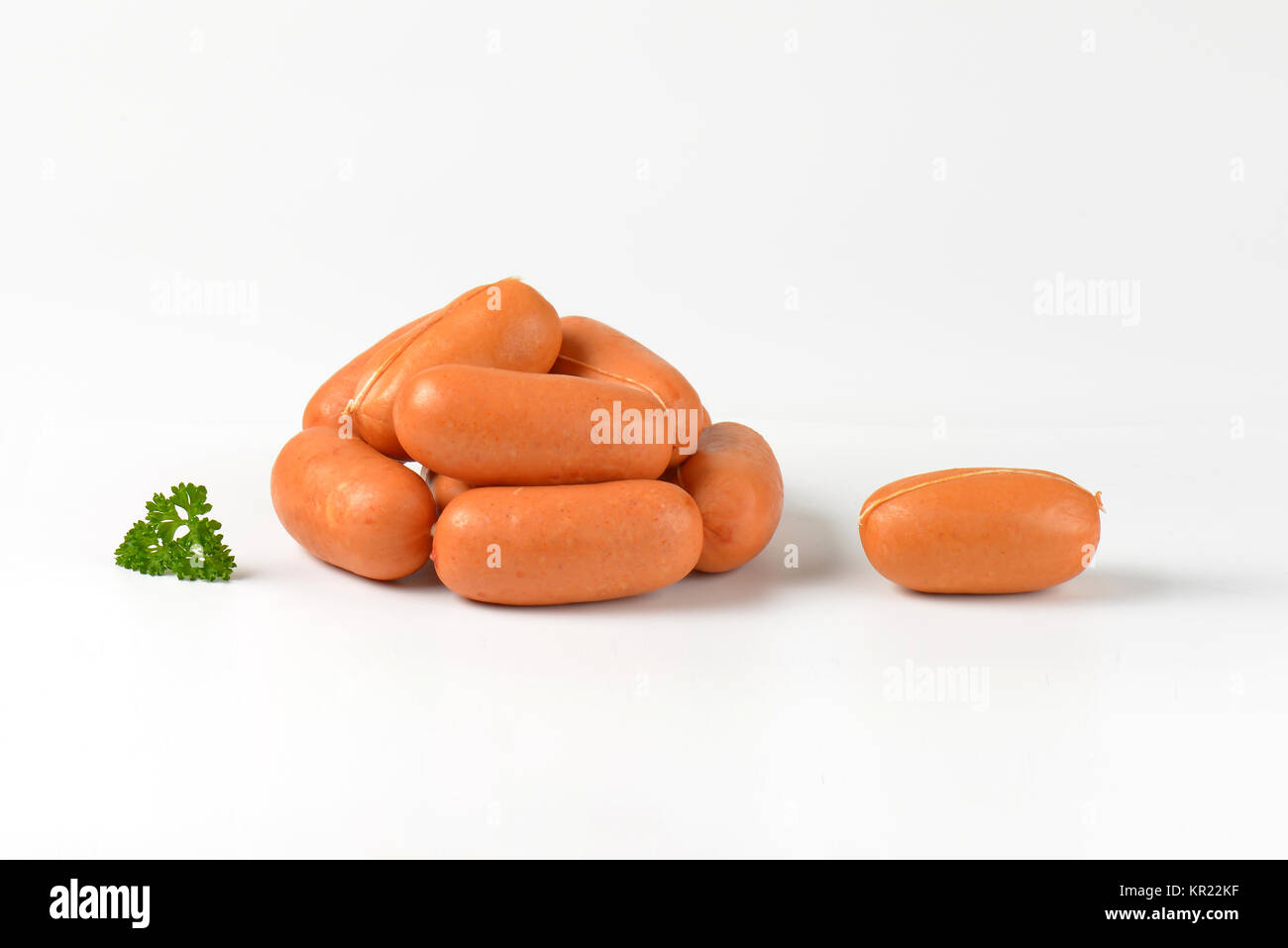 raw short sausages Stock Photo Alamy