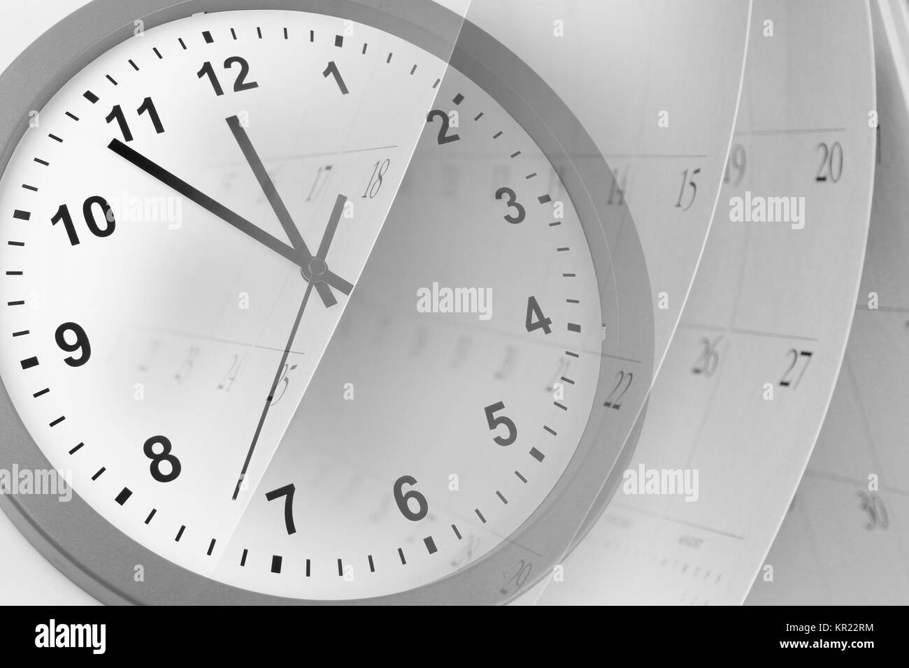 Clock face and calendar pages Stock Photo