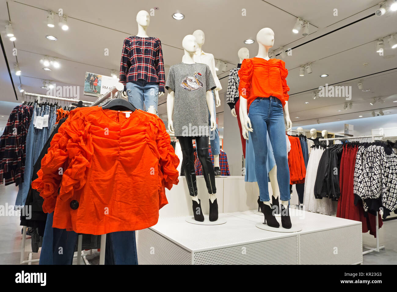 Kota Kinabalu, Malaysia - December 14, 2017: Inside of H and M store in Imago Shopping Mall. H&M is a Swedish multinational retail-clothing company fo Stock Photo
