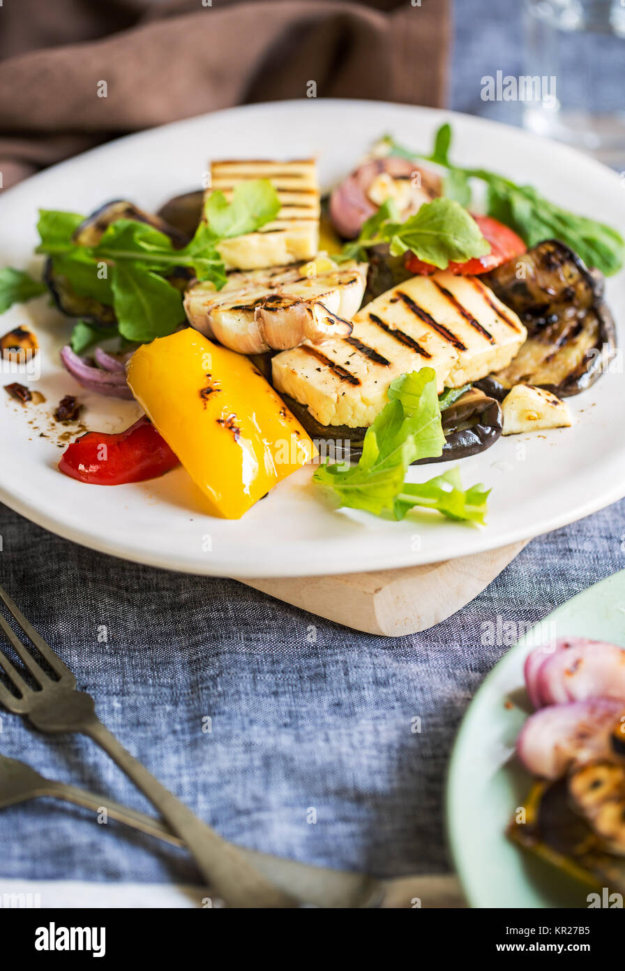 Grilled Halloumi with aubergine and pepper salad Stock Photo Alamy
